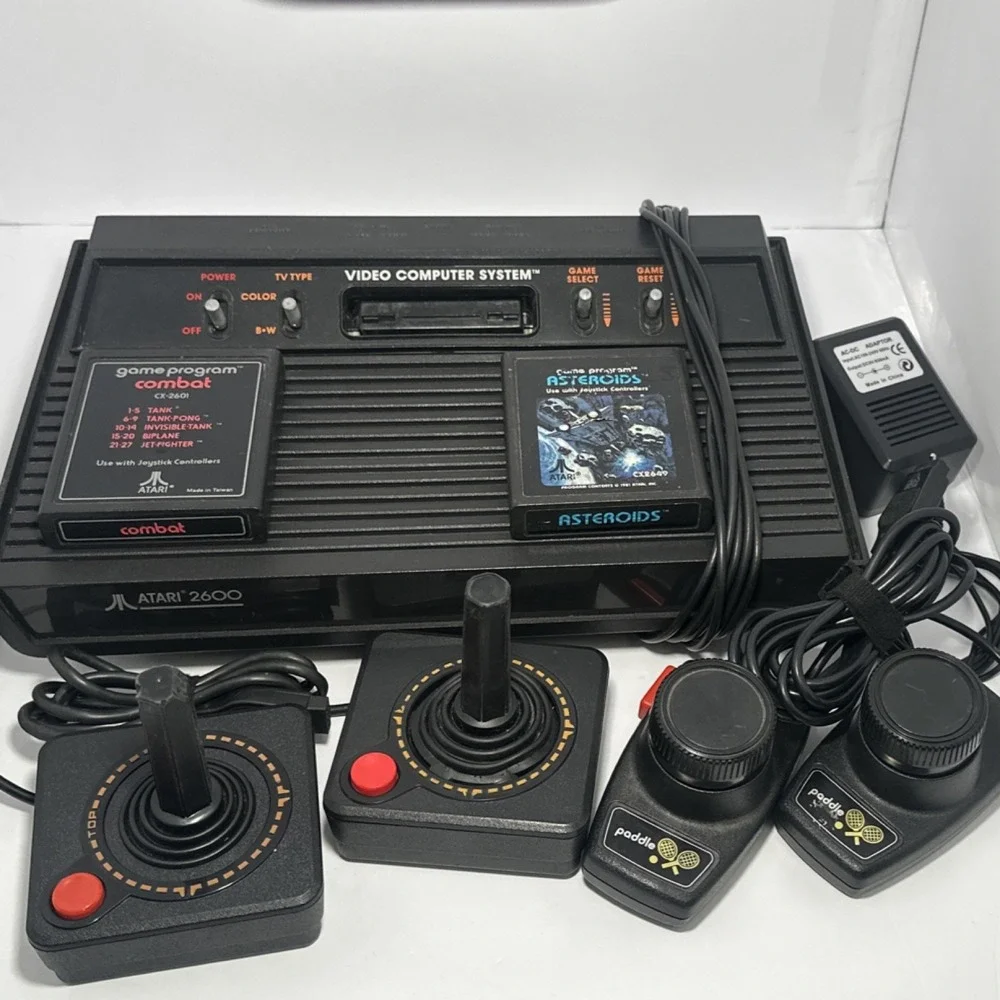 Atari 2600 Black Console RF w/ Joysticks, Paddle Controllers, Combat, Asteroids